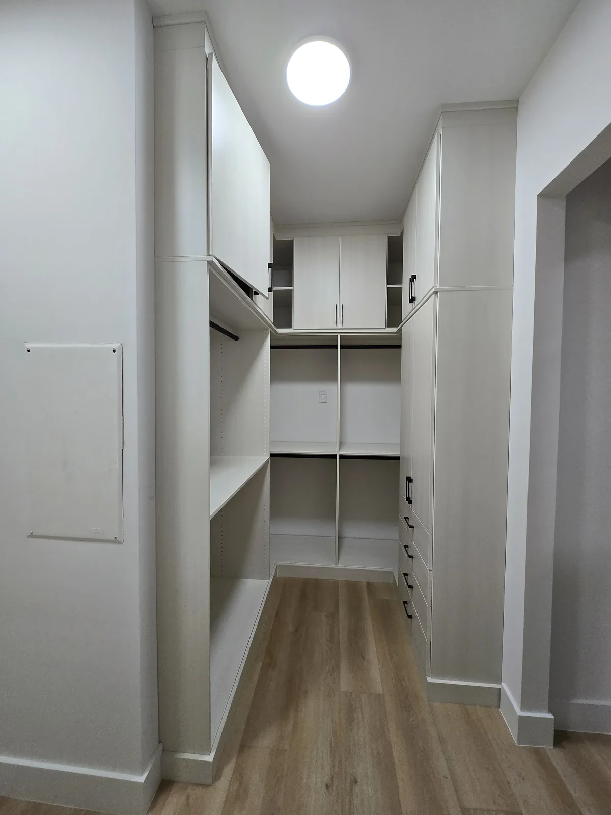 Custom walk-in closet with island shelving